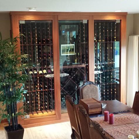 a simple elegant wine cabinet with glass doors